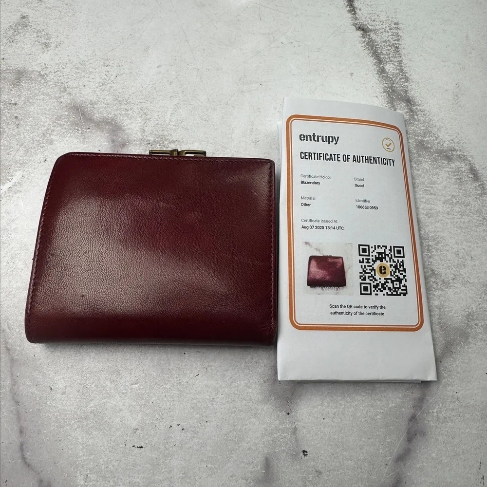 Gucci Leather GG Vintage Bifold Wallet